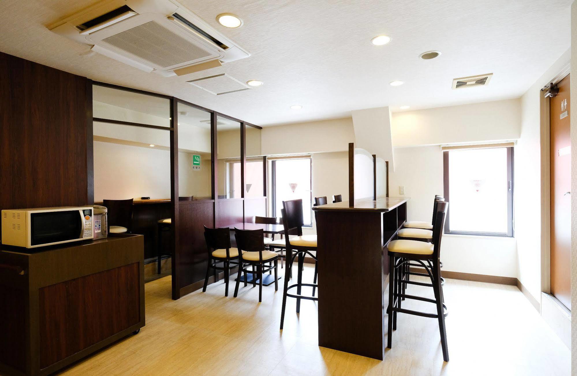 Business Inn Sunhotel Мачида Екстериор снимка