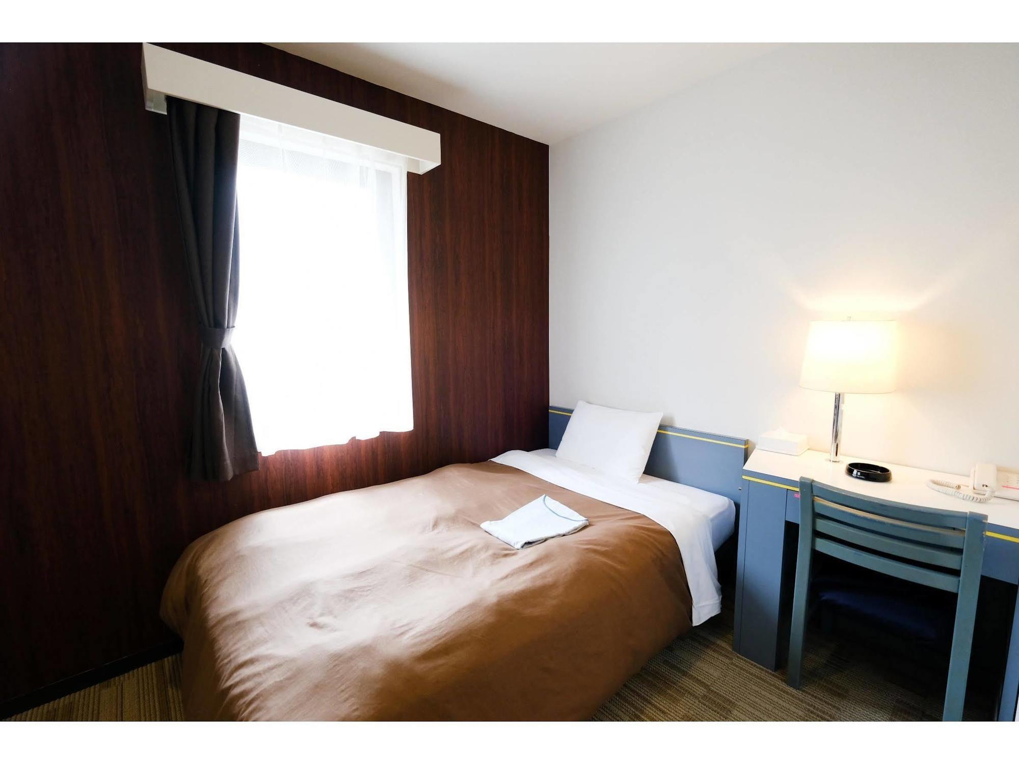 Business Inn Sunhotel Мачида Екстериор снимка